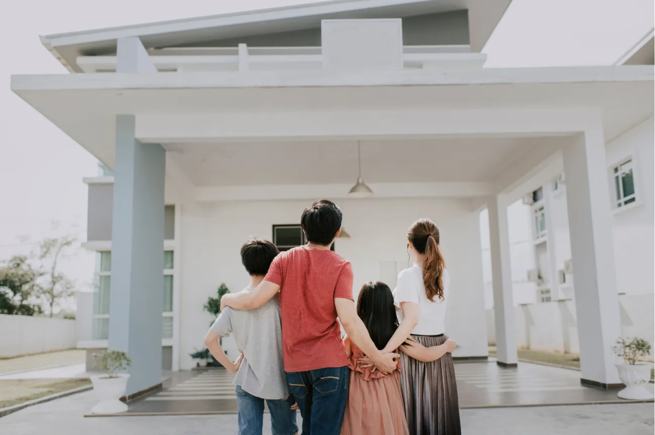 Family of four looking at a new house, planning their move in Perth.