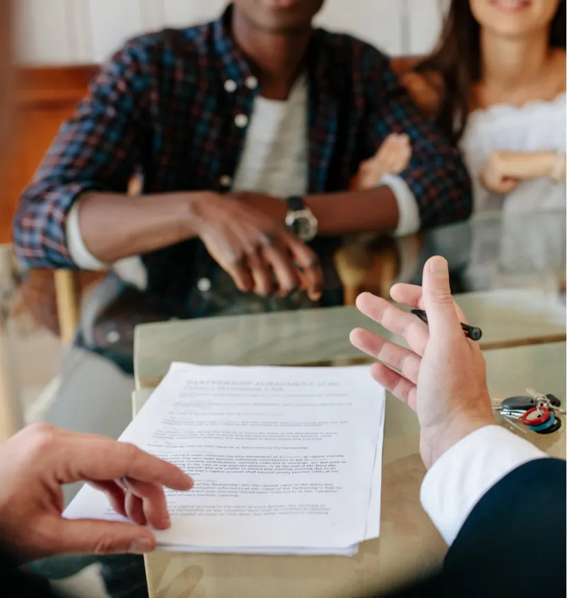 Mortgage advisor in Perth, explaining home loan options to a couple